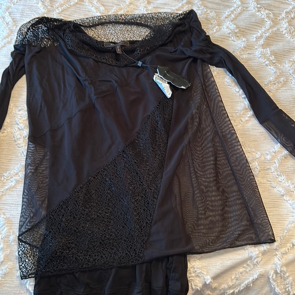 BCBG top never worn. Tags on. Too big for me